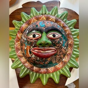 Terracotta Sun god sculpture